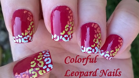 Colorful leopard nail art using a toothpick