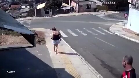 Dude stops a car from crashing by jumping in it