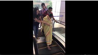 Woman terrified of escalator, takes stairs instead