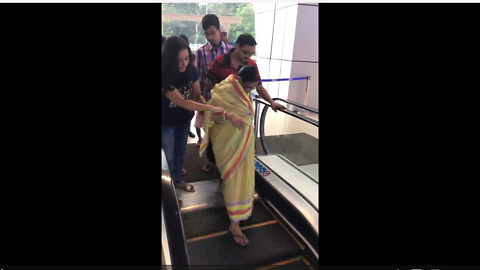 Woman terrified of escalator, takes stairs instead