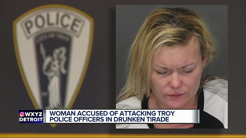 Woman allegedly assaults Troy police, eats pair of earrings