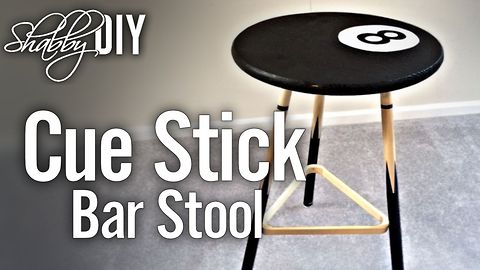 Make a bar stool using pool cue sticks and a ball rack
