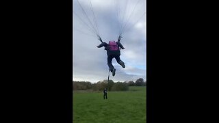 Paraglider towed up in flat field !