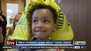 Preschoolers learn about going green with fashion show