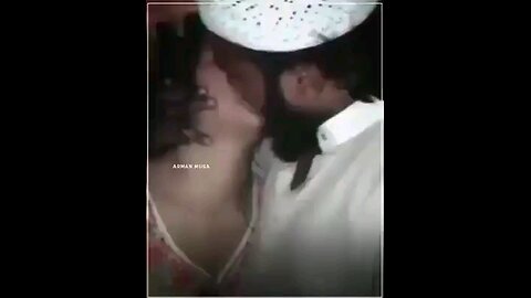 Another Muslim pervert kissing a very young girl and as they do - Filming his crime!