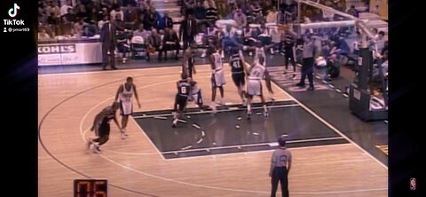 Tim Duncan dunking over the Milwaukee Bucks