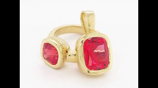 Custom 18k yellow gold pendant and ring set featuring Chatham-created padparadschas