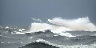 BOAT IN ROUGH WATER