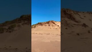 Walking along a beach in Canada