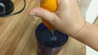 Making Fresh Tangerine Flavored Sparkling Water