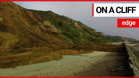 Dramatic footage shows huge landslide on a quiet beach