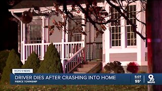 Driver dies after crashing into home in Pierce Township