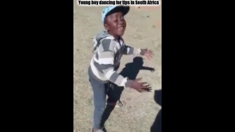 Zulu Clips: Young boy dancing for tips in South Africa