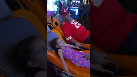 Bella and Grandpa Enjoying The Rollercoaster Simulator at Dave n Busters.