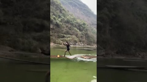 Tall Chinese Girl Could Outrun A Motorcycle Across A Floating Wood Bridge In China