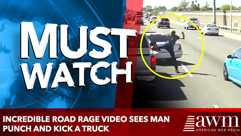 Incredible road rage video sees man punch and kick a truck