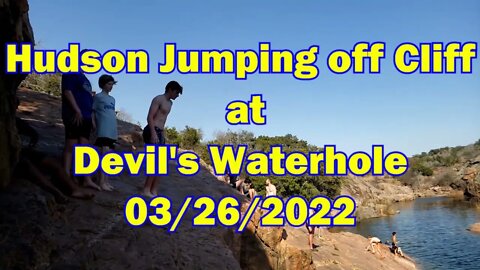 Hudson Jumping Off Cliff at Inks Lake Devils Waterhole
