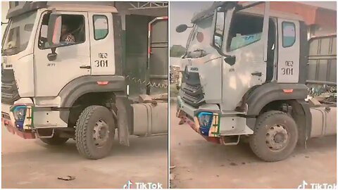 Nigerian Young Slim Lady DEmonstrates Confidence Driving Truck