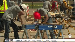 High school students network with industry professionals at construction competition