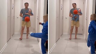 Baby gets hit directly in the face by soccer ball
