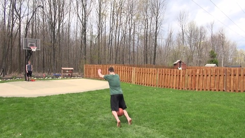 Frontflip basketball trick shot from 40 feet away