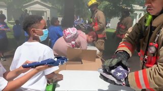 Elementary students observing Flag Day