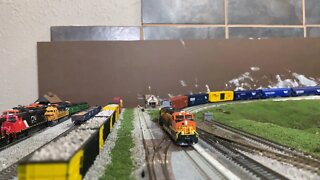 N Scale BNSF train pulling heavy load with DPU