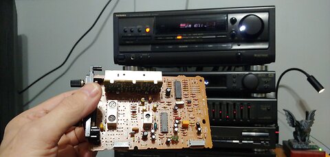 Technics SA-EX410. tuner problems. tone in the background.