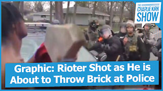 Graphic: Rioter Shot as He is About to Throw Brick at Police