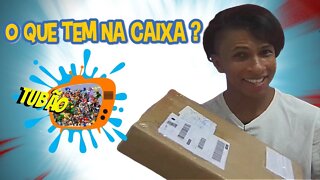 O que tem na caixa ?