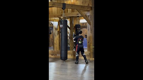 Warm up before sparring. 12 year old purple belt.