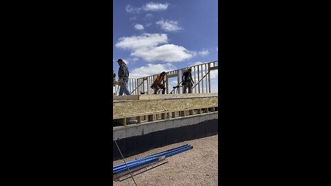 Putting up the west wall