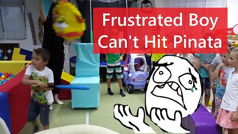 Frustrated Boy Throws Bat After Missing Pinata!