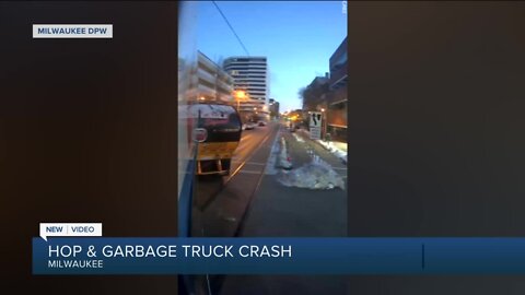 Hop and garbage truck crash in Milwaukee