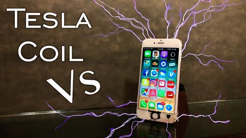 TESLA COIL VS iphone (250,000 VOLTS!)