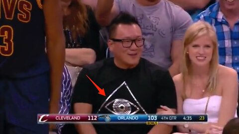 'Fan wearing ILLUMINATI shirt reaches into LeBron James - ILLUMINATI SPORTS EXPOSED' - 2015