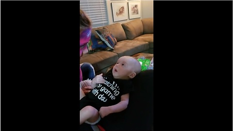This Baby Got His Mind Blown By Sister's Face Paint