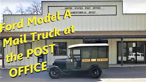 1929 Ford Model A Mail Truck appears at the Post Office. Traffic stops.