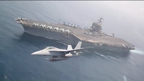 F/A-18E Maneuvers Around the Carrier
