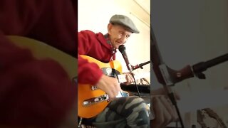 Old Man Plays On A Guitar And Sings (tiktok)