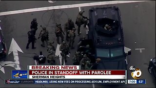 Police in standoff with parolee