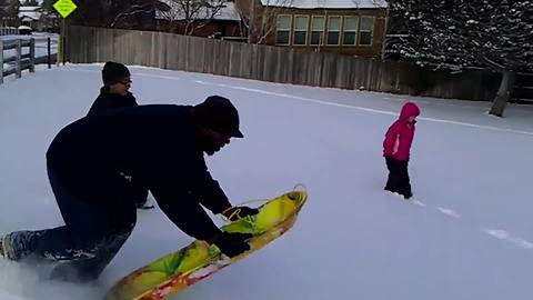 "Skeleton Ride: A Man Jumps On A Sled As It Goes Down A Snowy Hill"