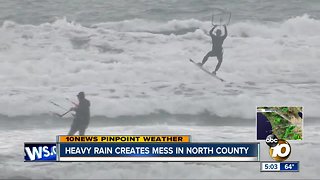 Kite surfers take advantage of windy conditions