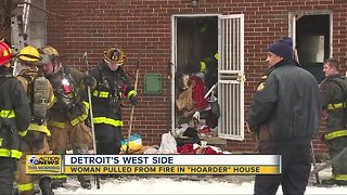 Woman pulled from fire in 'hoarder house' in Detroit