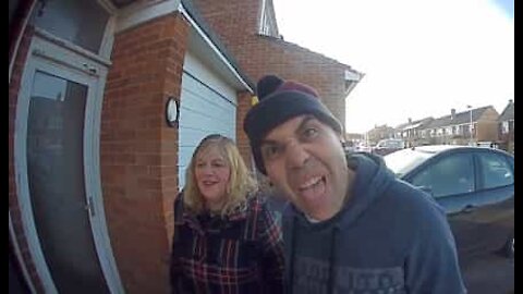 Parents having fun with daughter's Ring Video Doorbell