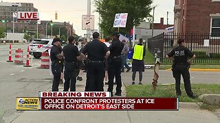 Police confront protesters at ICE office in Detroit