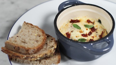 200-calorie baked egg with basil and sun-dried tomatoes