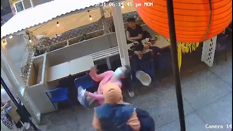 Thug Randomly Sucker Punches Asian Woman on NYC Sidewalk