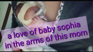 A love of baby sophia in the arms of this mom