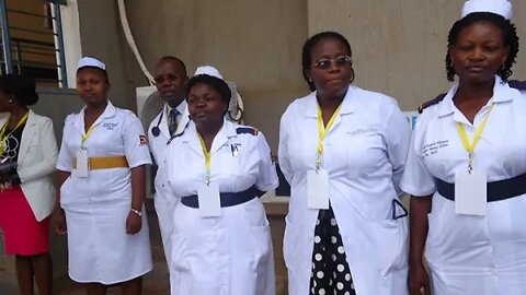 PAN AFRICAN BLISS-DOCTORS IJN UGANDA KNEEL ASKING MUSEVENI TO KEEP RUNNING THE RUNNING